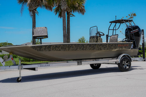 2025 Sea Ark 1960 Slayer Pro green aluminum boat with camo canvas at Lake & Trail USA in Okeechobee, FL.