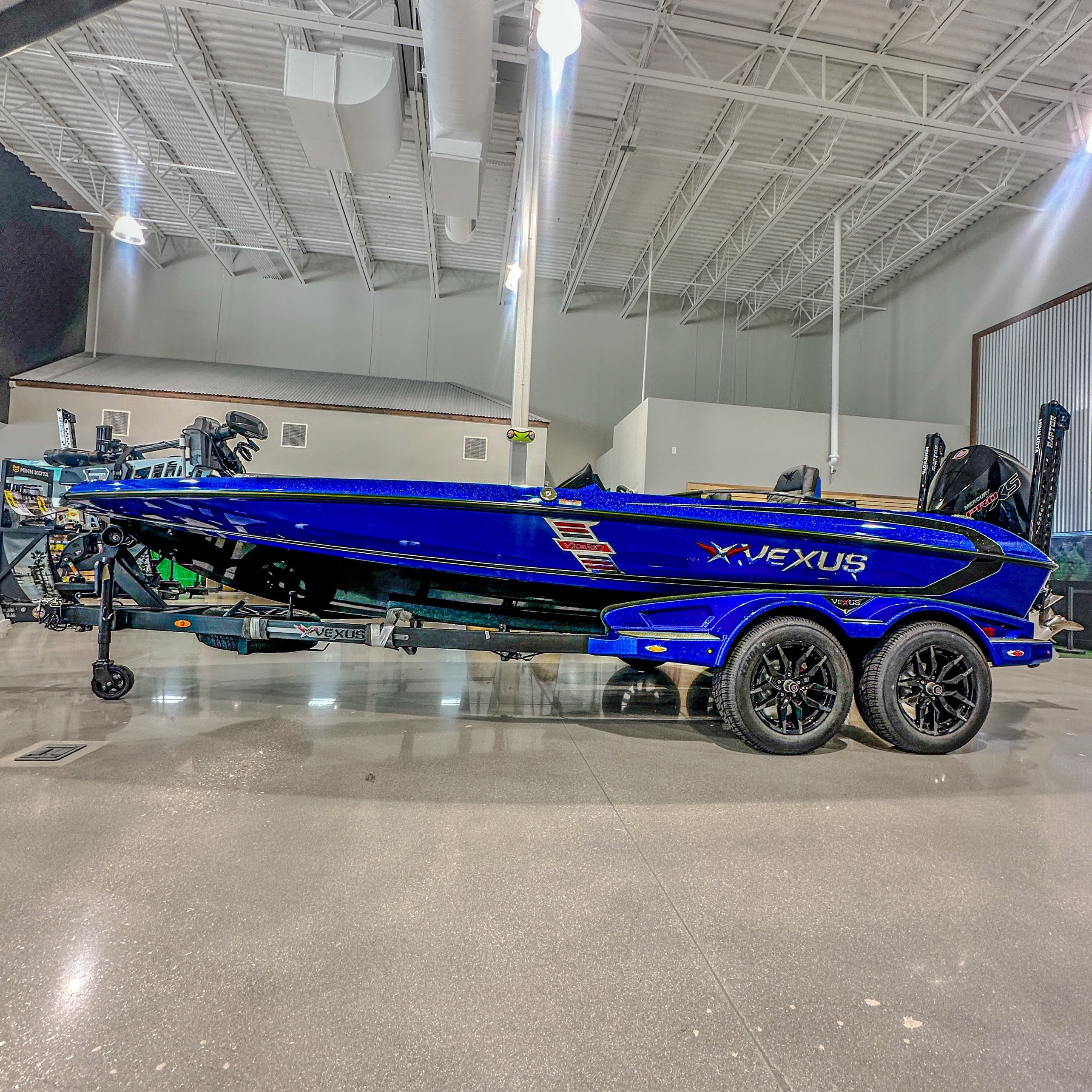 2025 Vexus VXS20 blue fiberglass bass boat with Mercury 250 Pro XS at Lake & Trail USA in Okeechobee, FL.
